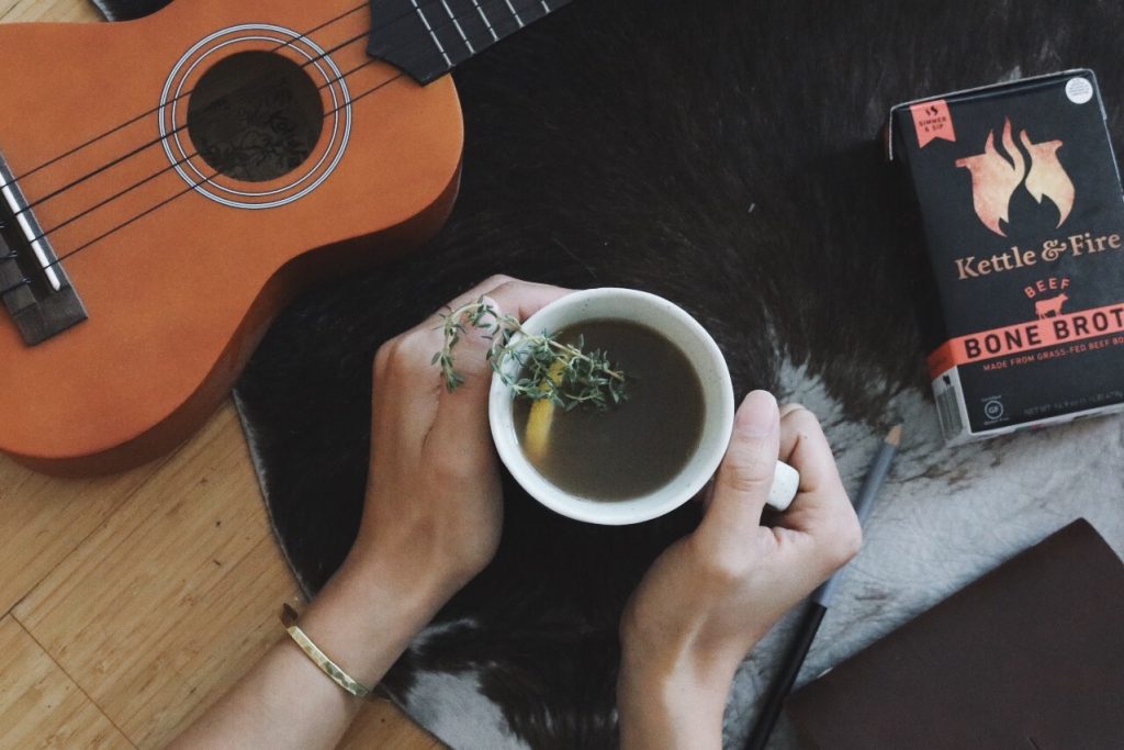 Kettle and Fire Bone Broth in a mug