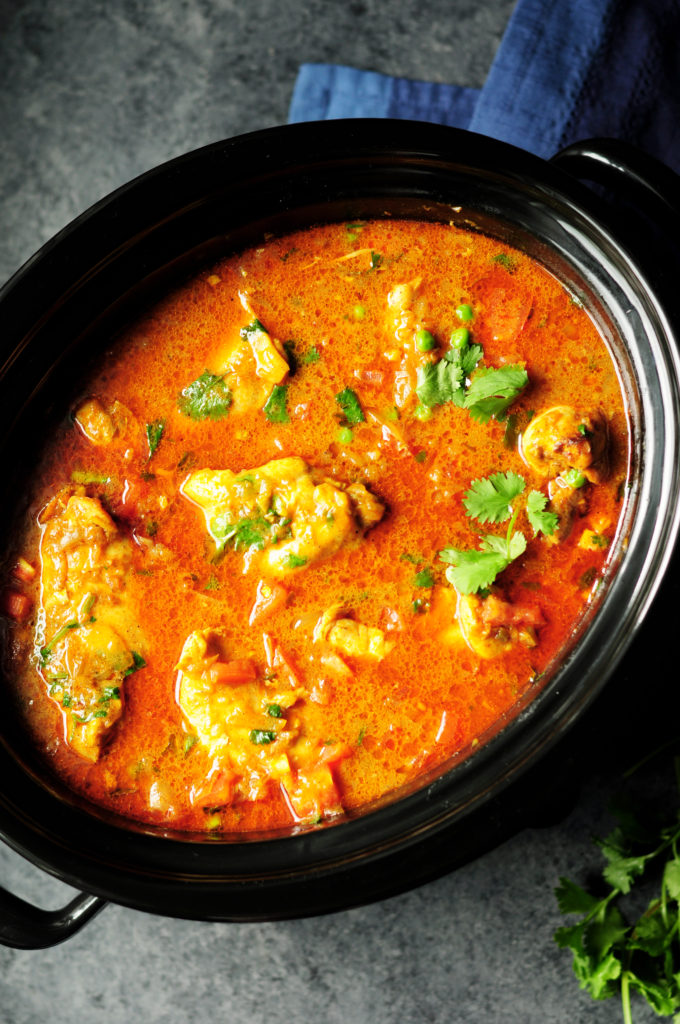 This slow-cooker curry chicken is made with juicy chicken thighs in a mild curry sauce, then slow-cooked with spices, fresh veggies, and coconut milk.