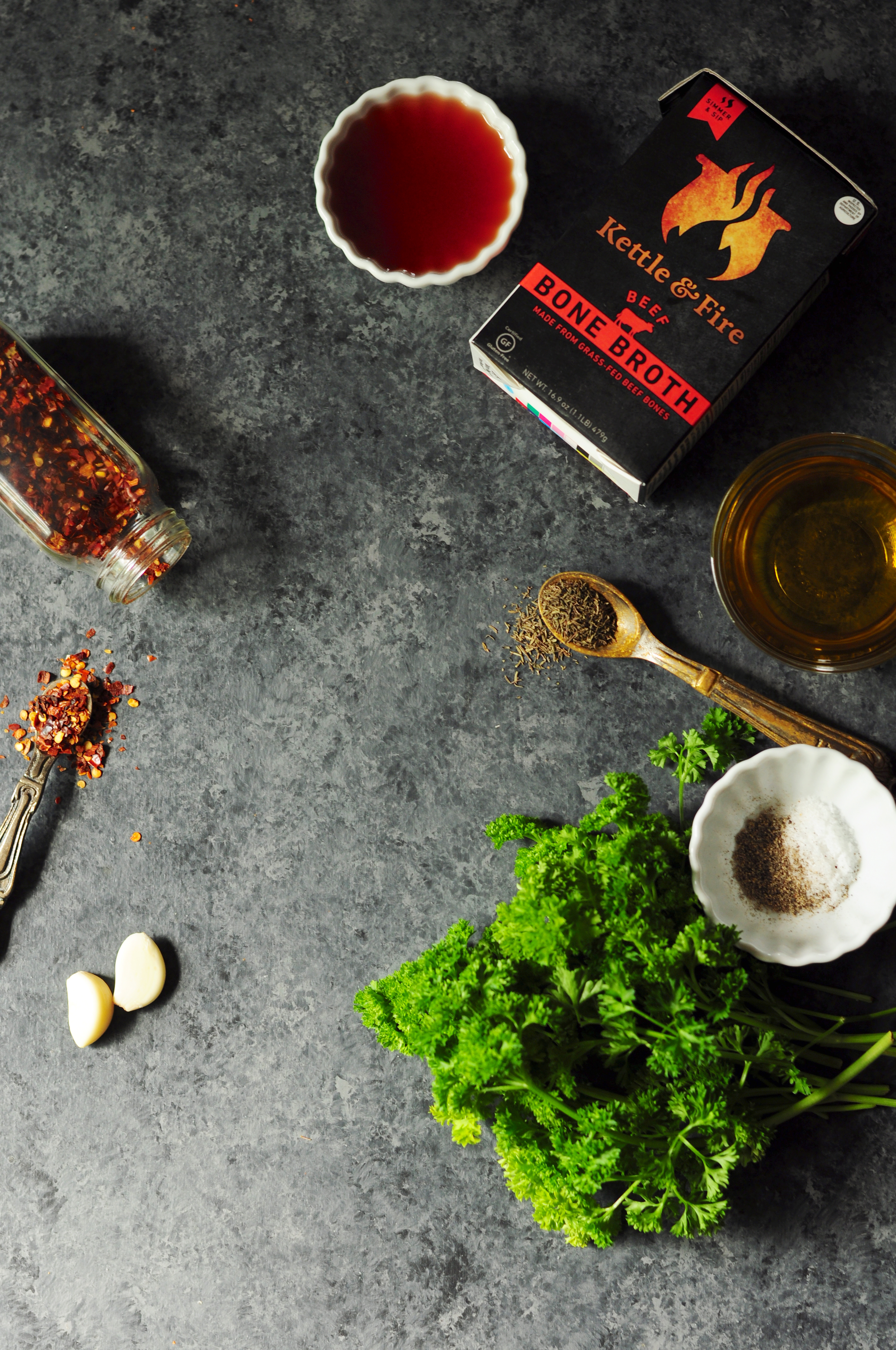 Learn how to make chimichurri sauce in 10 minutes or less. This green chimichurri is made with bone broth and avocado for a surprising twist on a classic.