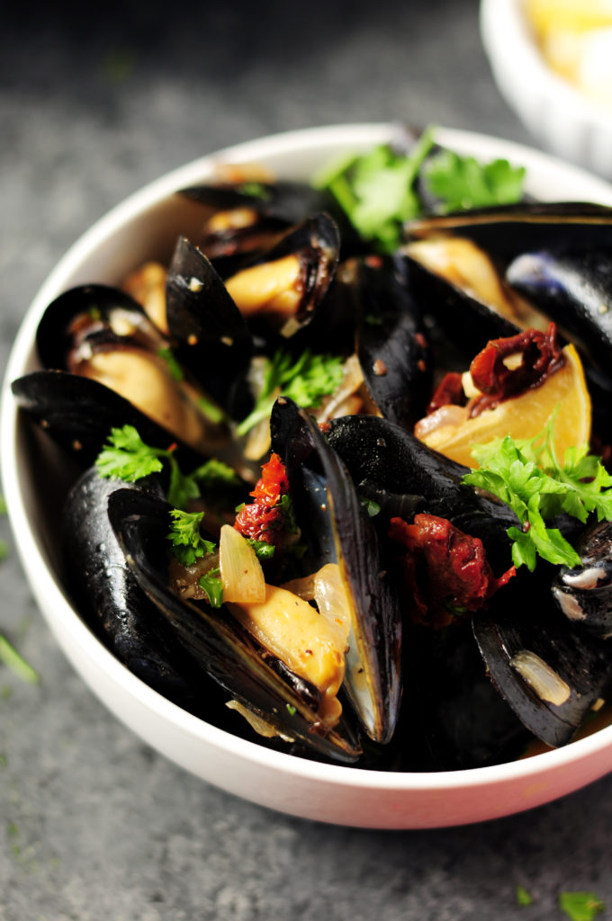 These restaurant-quality steamed mussels in white wine sauce are healthy, easy, and delicious. Ready in 25 and loaded with fresh flavor. Optional to serve with pasta.